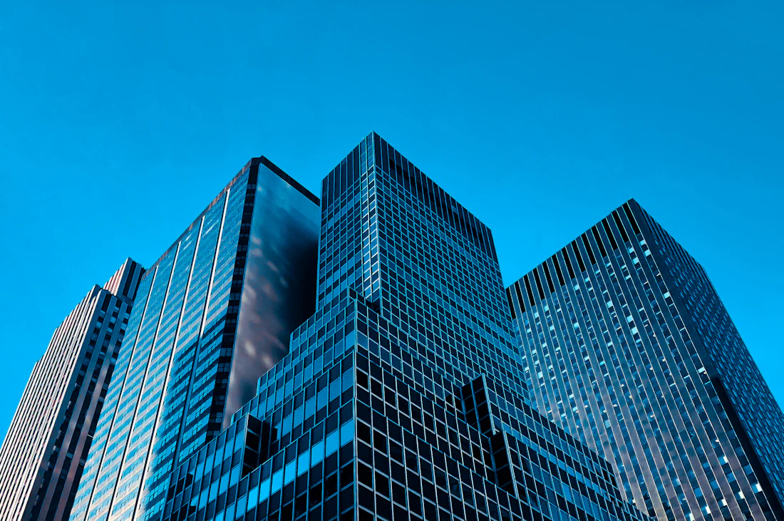 Glass office tower against the sky